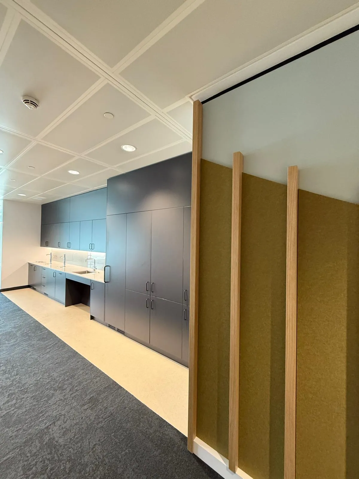Finished workplace interior with a suspended ceiling